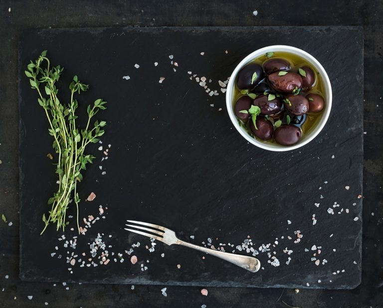 food frame on dark stone backdrop mediterranean PBM9G9Y