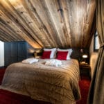 Спальня 1 в роскошном лыжном шале Tomkins In Meribel 2