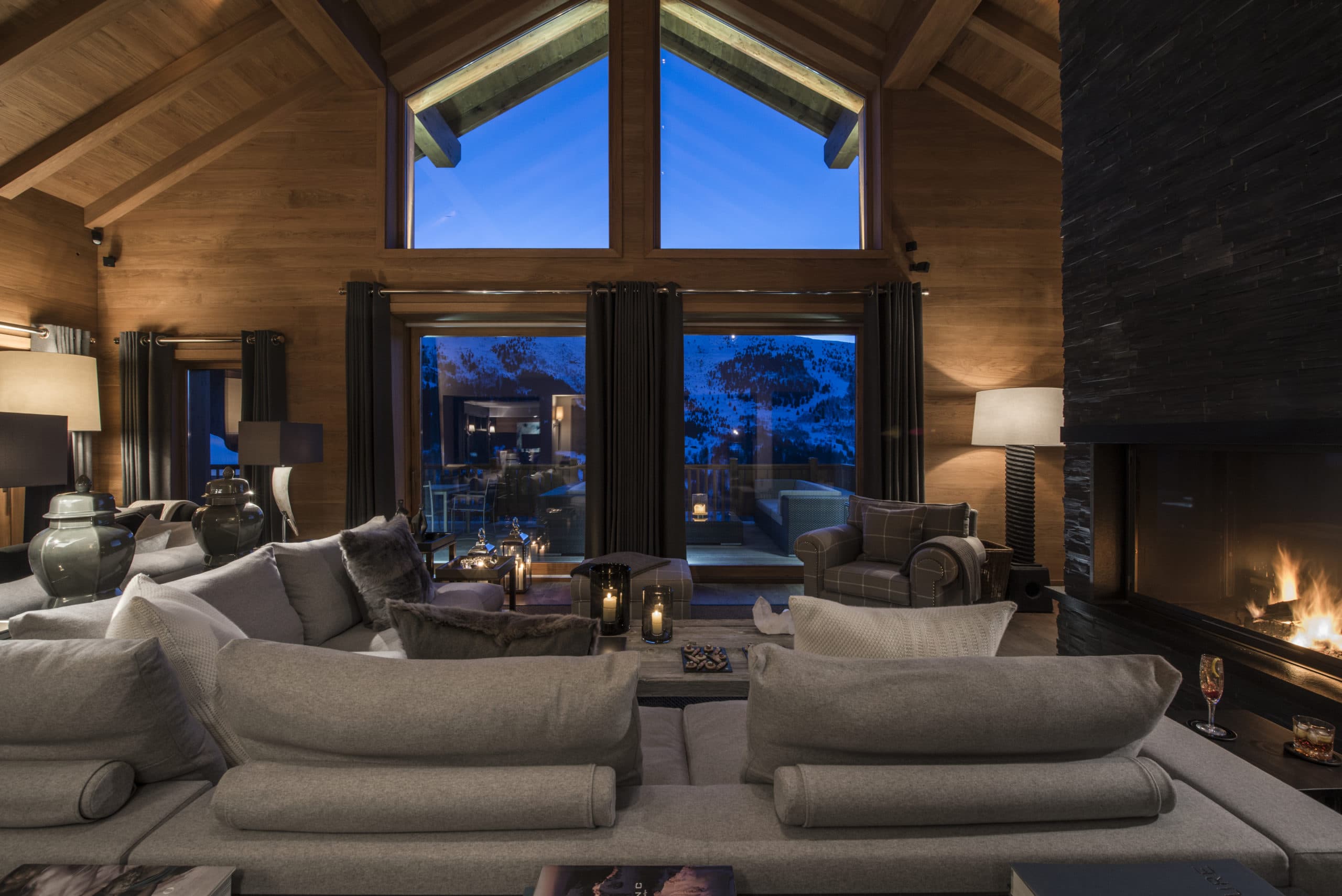 3. living area fire Chalet Le Grenier Luxury Ski Chalet Meribel